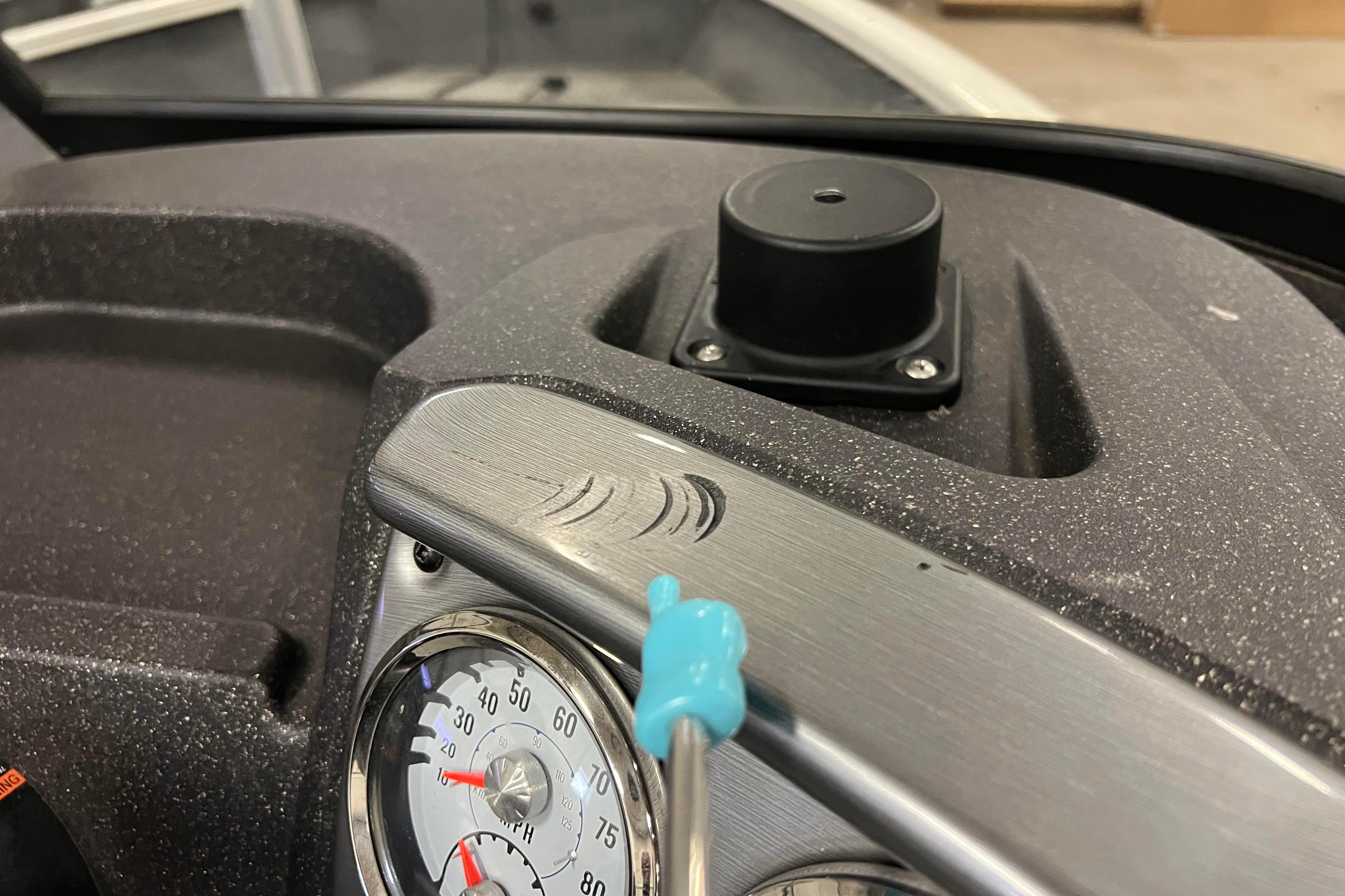 Dashboard of 2022 Tracker Pro Guide V-16 WT boat with speedometer and control panel.