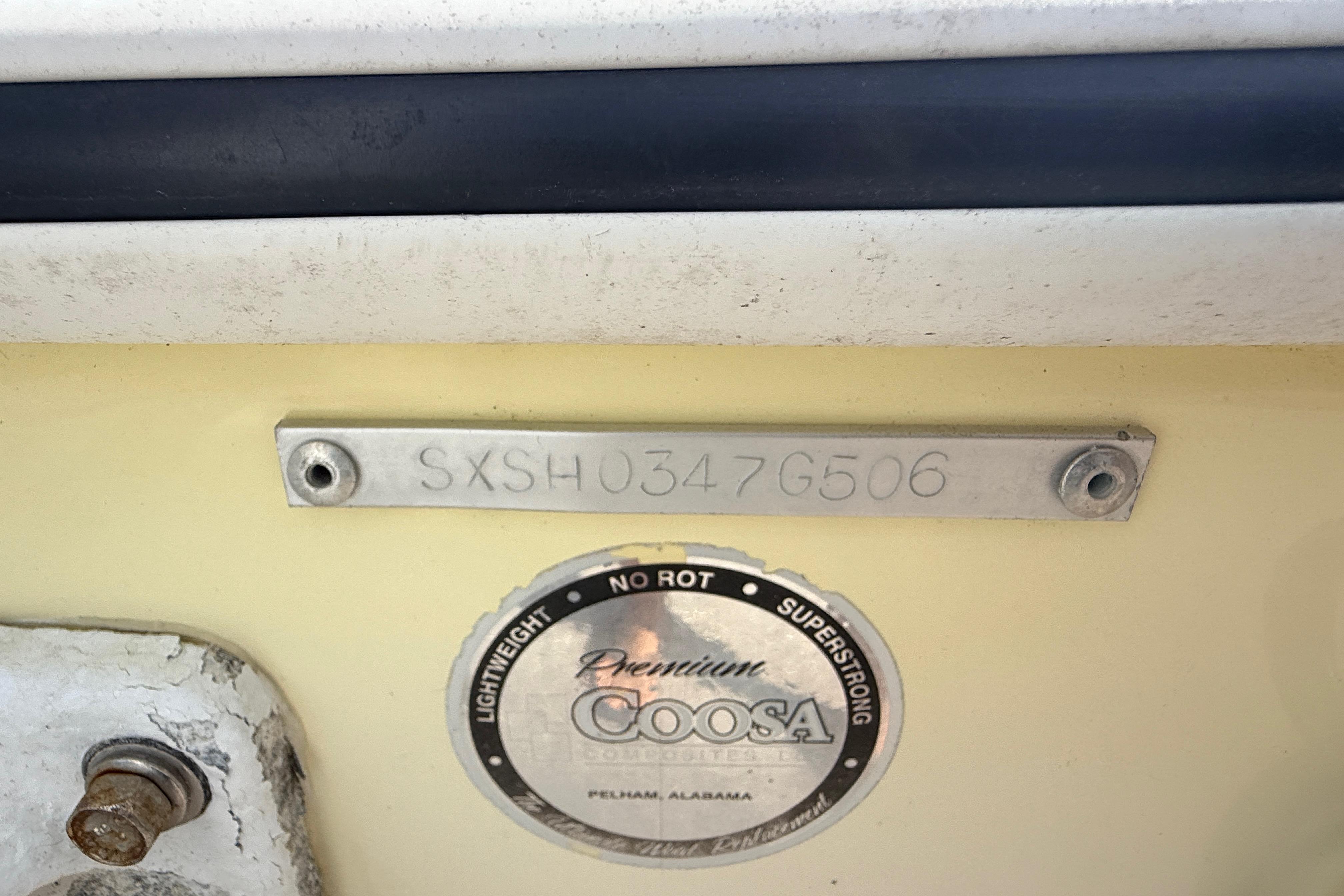 2006 Sea Hunt Triton 220 boat identification plate and Coosa composite label.