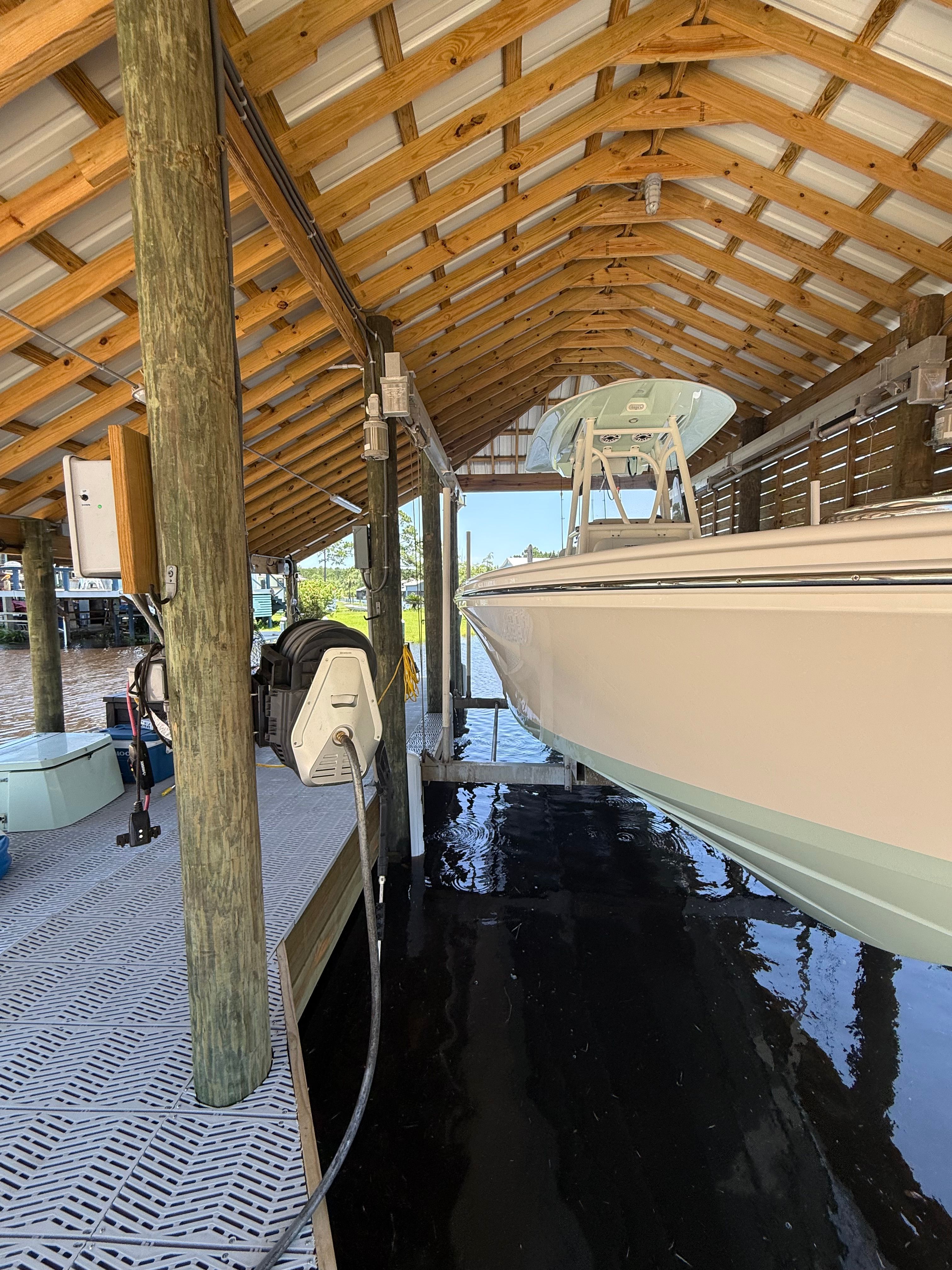 2024 Pathfinder 2700 Open boat in covered dock.
