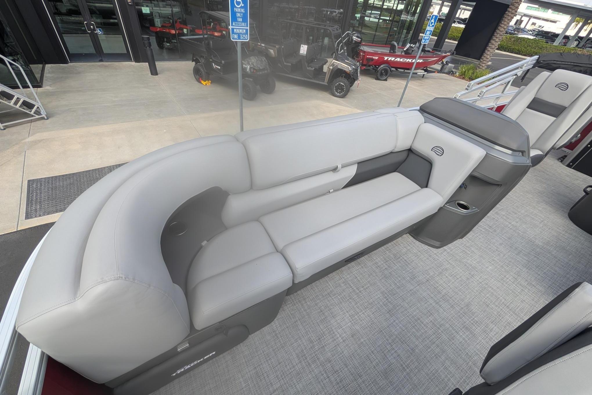 2026 Sun Tracker SportFish 20 DLX pontoon boat with spacious seating and modern design.