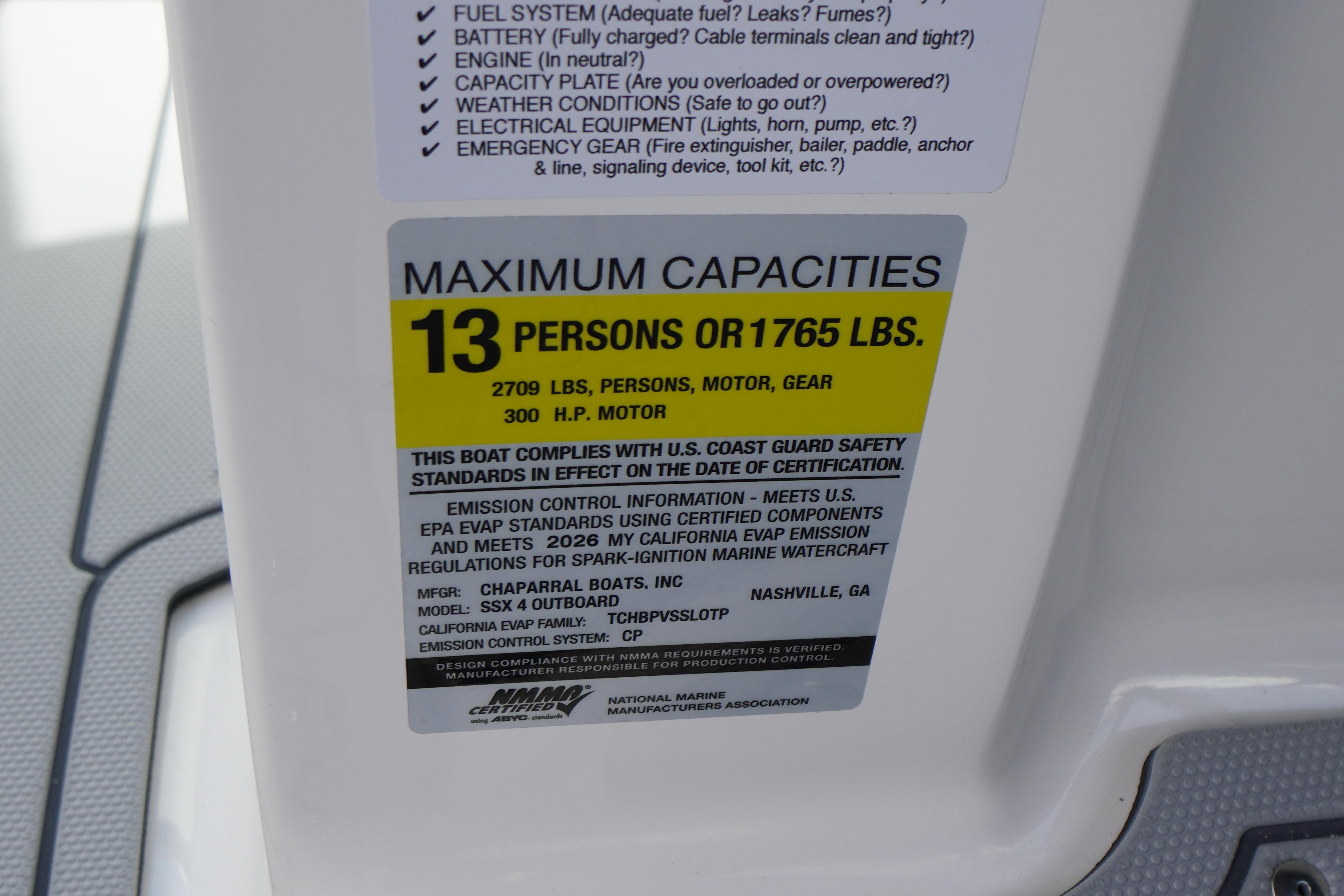 2026 Chaparral SSX 4 capacity label: 13 persons, 1765 lbs, 300 HP motor.