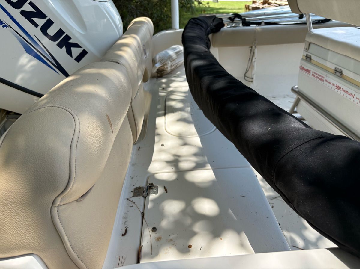 Interior view of a Key West 189 FS boat with Suzuki engine.