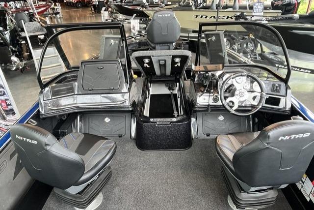 Interior view of 2025 Nitro ZV21 Pro boat with modern seating and dashboard controls.