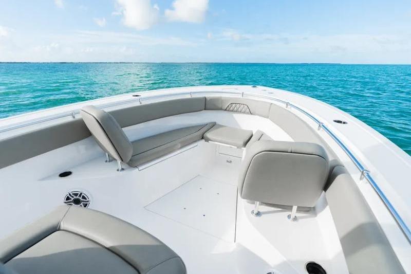 2026 Sportsman Open 282 Center Console boat on clear blue ocean waters.