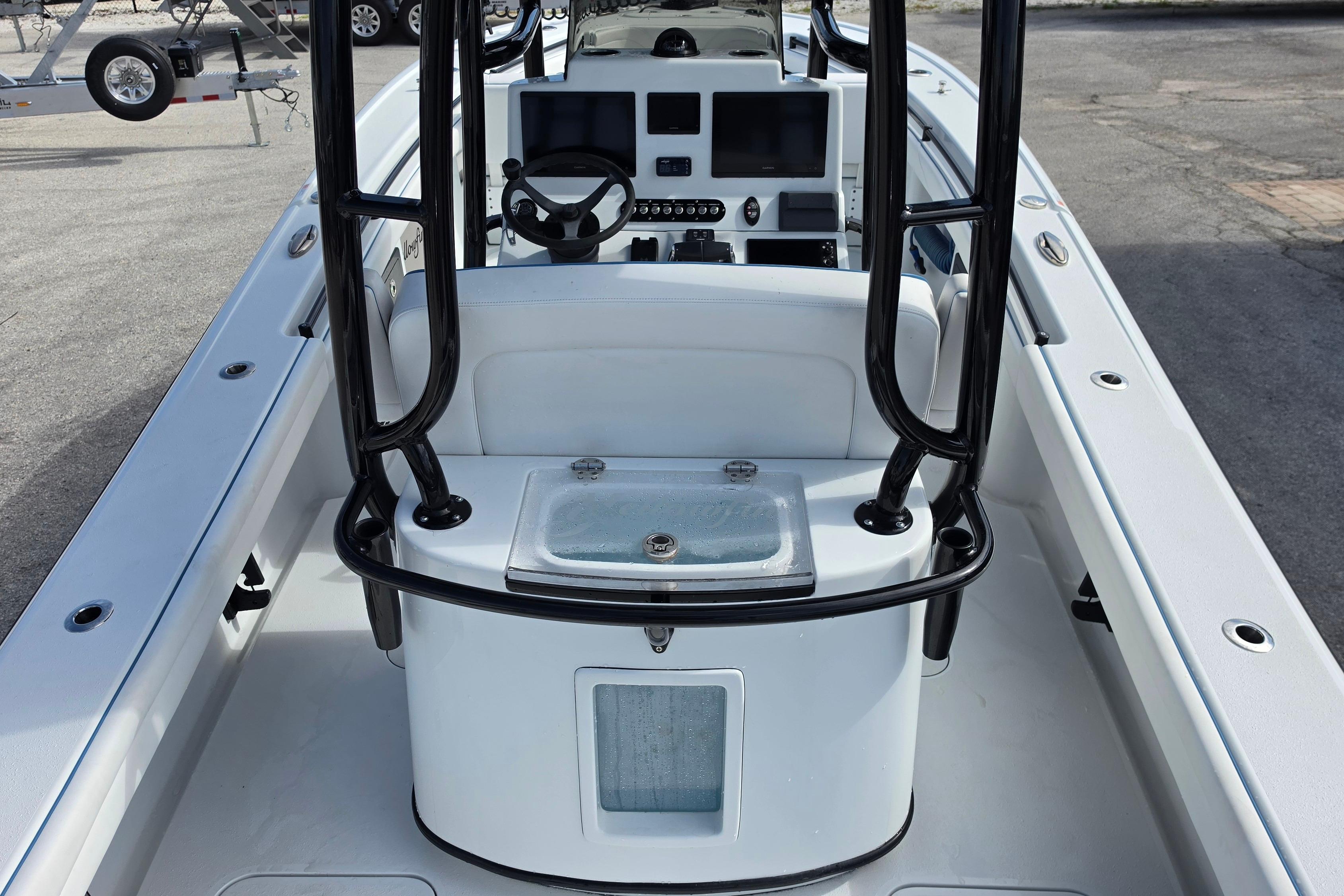 2025 Yellowfin 26 Hybrid boat interior with modern console and seating.