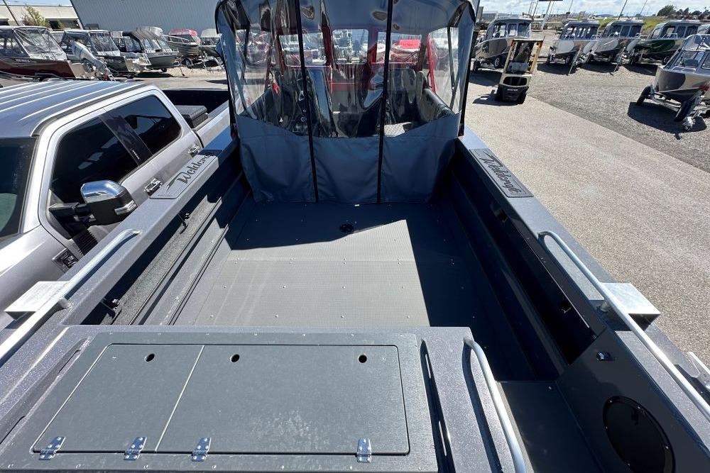 2026 Weldcraft 240 Maverick DV boat interior with spacious deck and covered cabin.