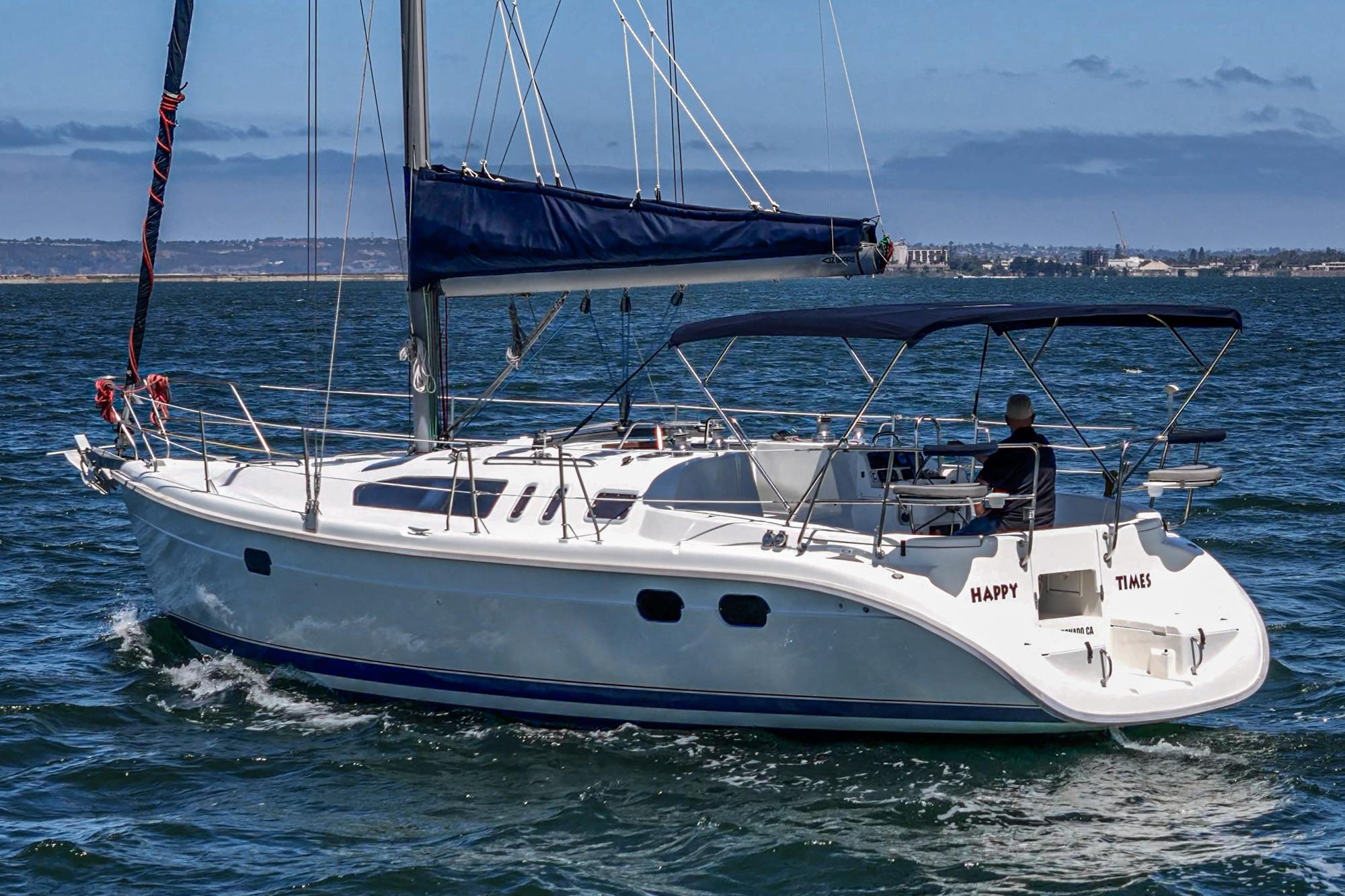 Sailing yacht "Happy Times," 1996 Hunter 376, cruising on open water.