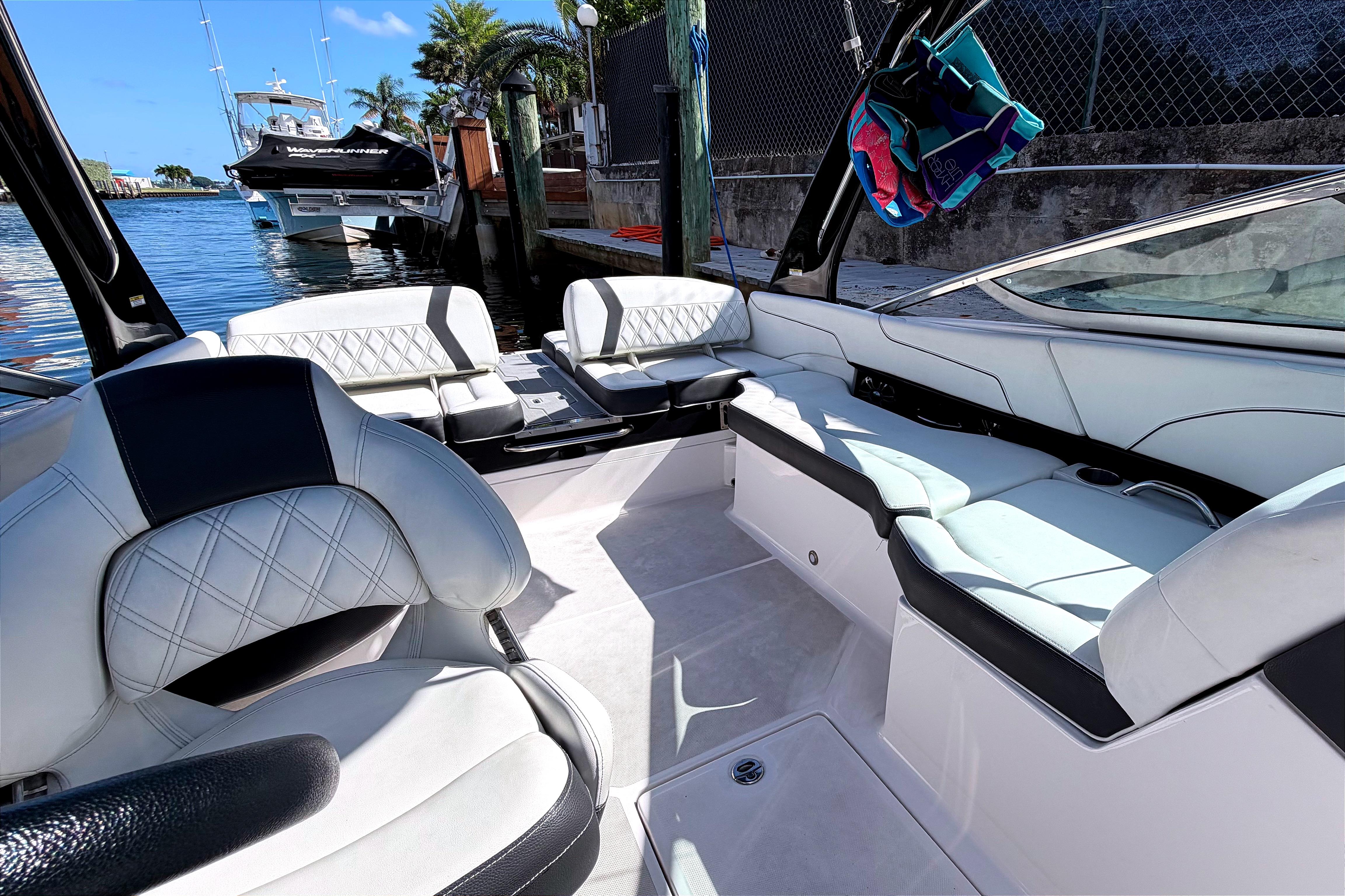 2020 Regal 2300 Bowrider interior with luxurious seating and waterfront view.