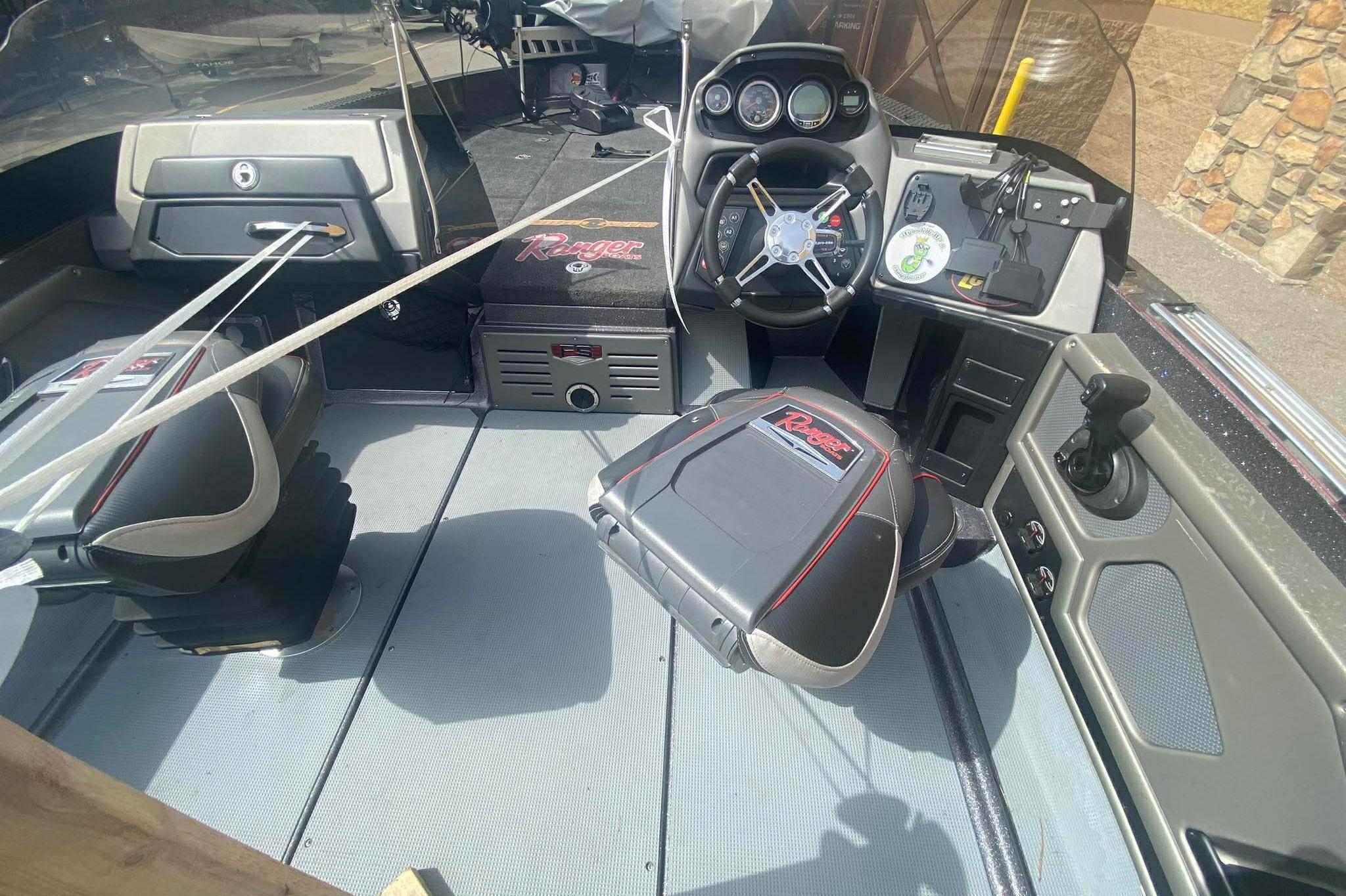 2017 Ranger 621FS Fisherman boat interior with steering wheel and seating.