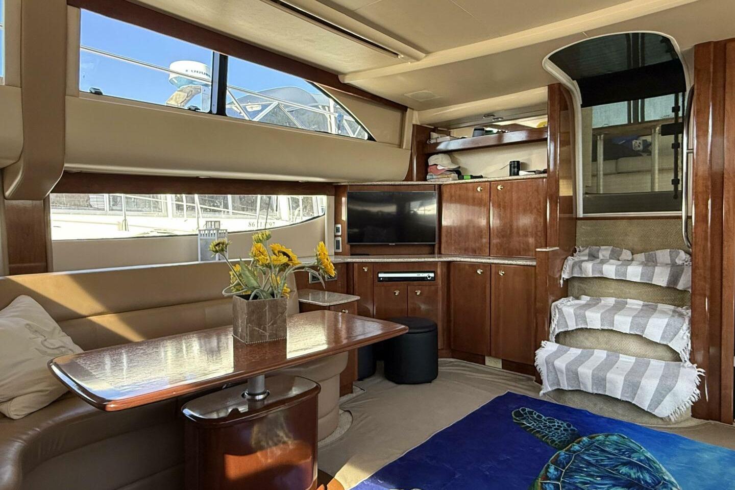 Luxurious interior of 2008 Meridian 459 Motoryacht with elegant wood finishes and modern amenities.