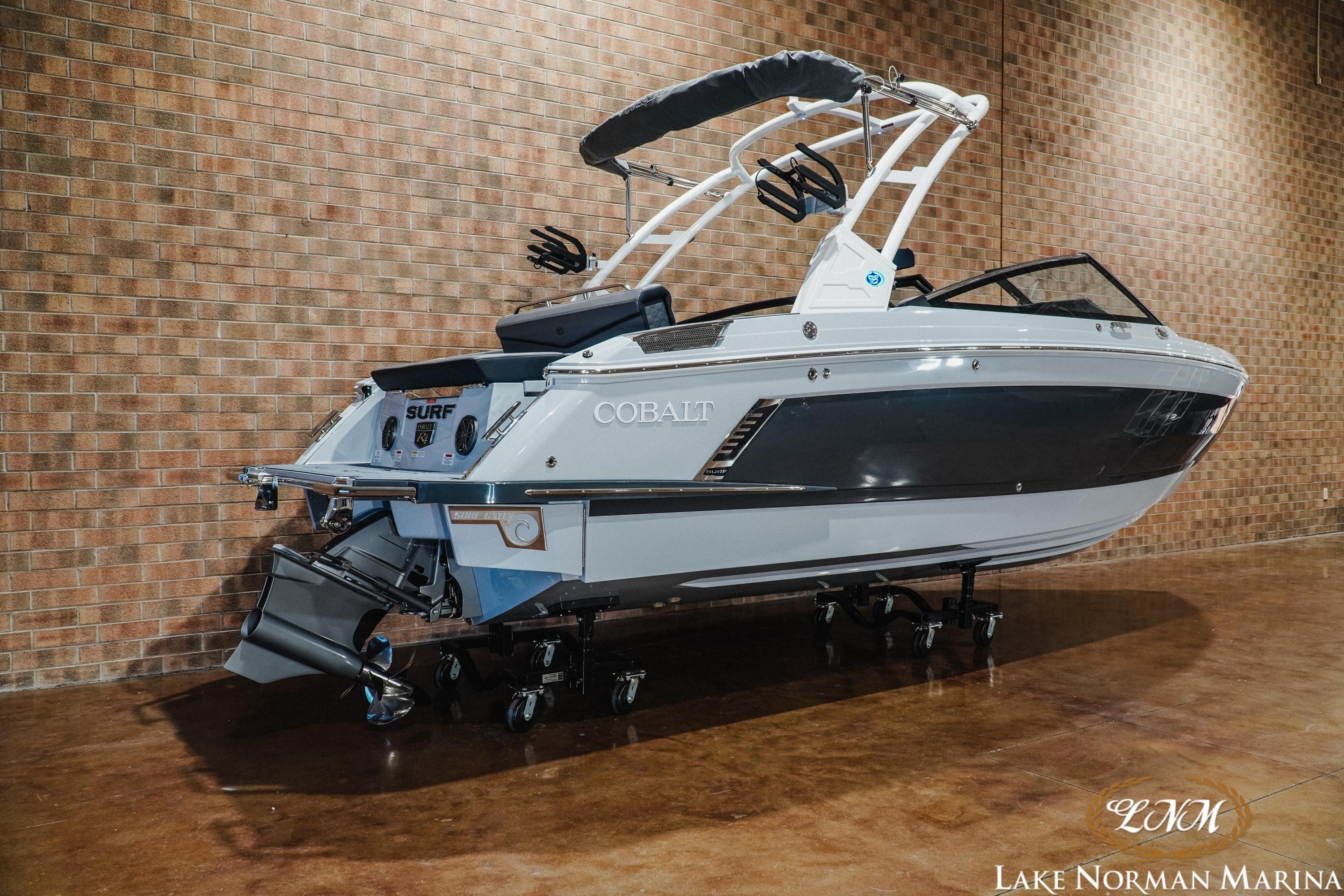 2026 Cobalt R4 Surf boat displayed indoors at Lake Norman Marina.