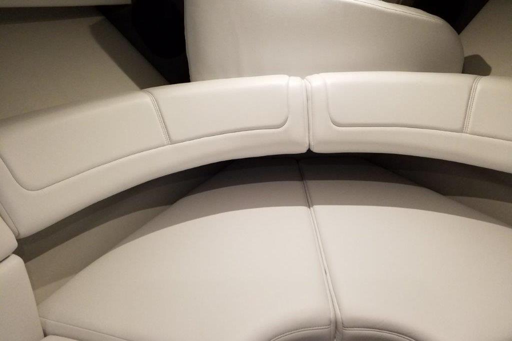 2021 Formula 350 Sun Sport interior seating with elegant white upholstery.