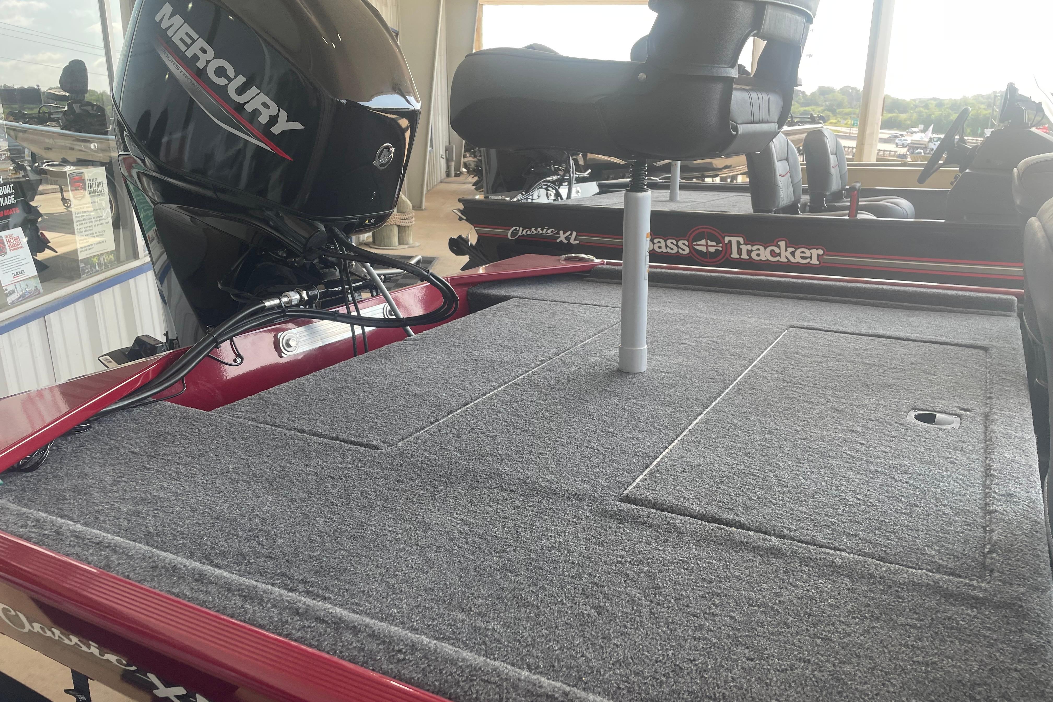 2026 Tracker Bass Tracker Classic XL boat with Mercury engine, featuring spacious deck and seating.