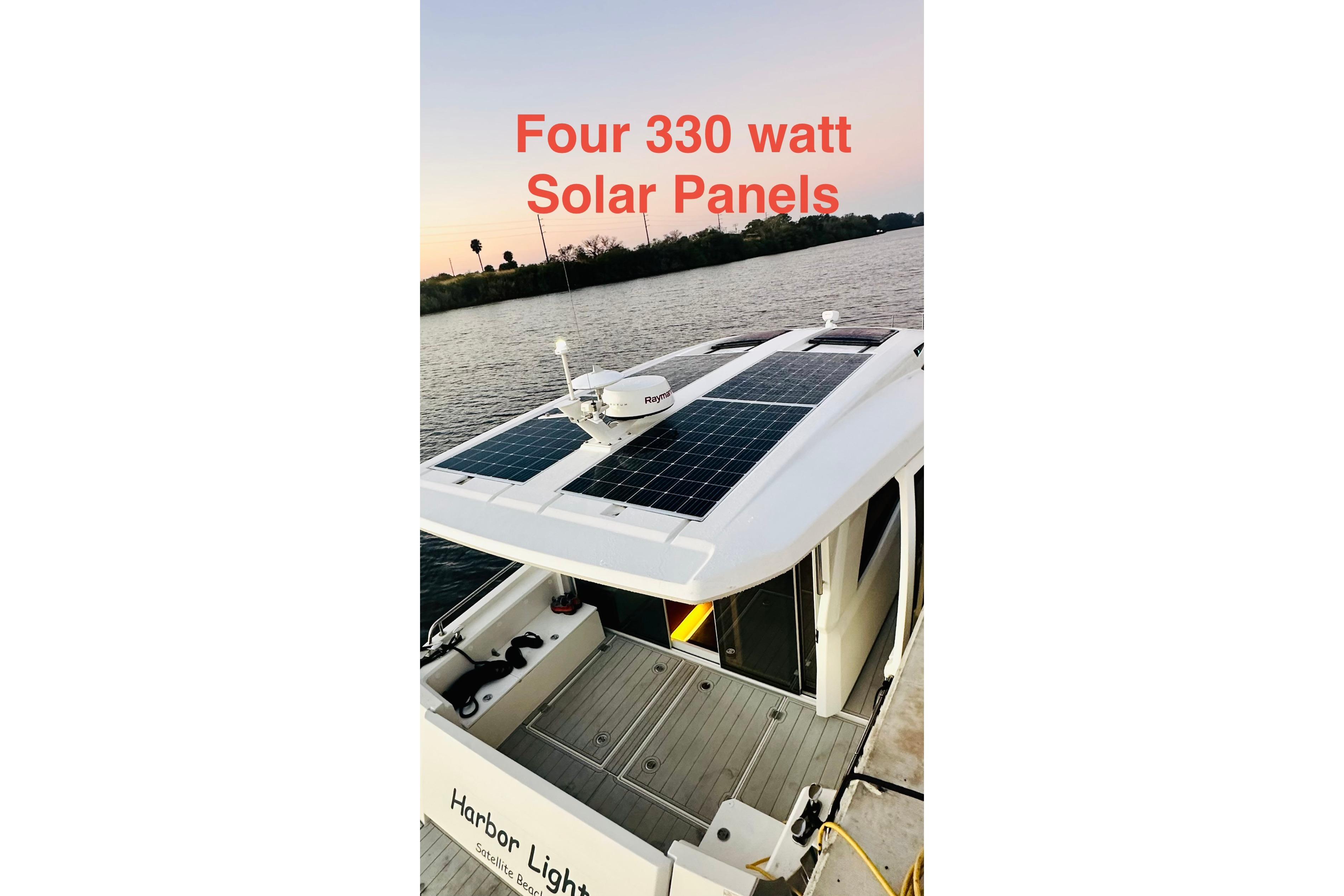 2021 Greenline 39 Hybrid boat with four 330-watt solar panels on the roof.