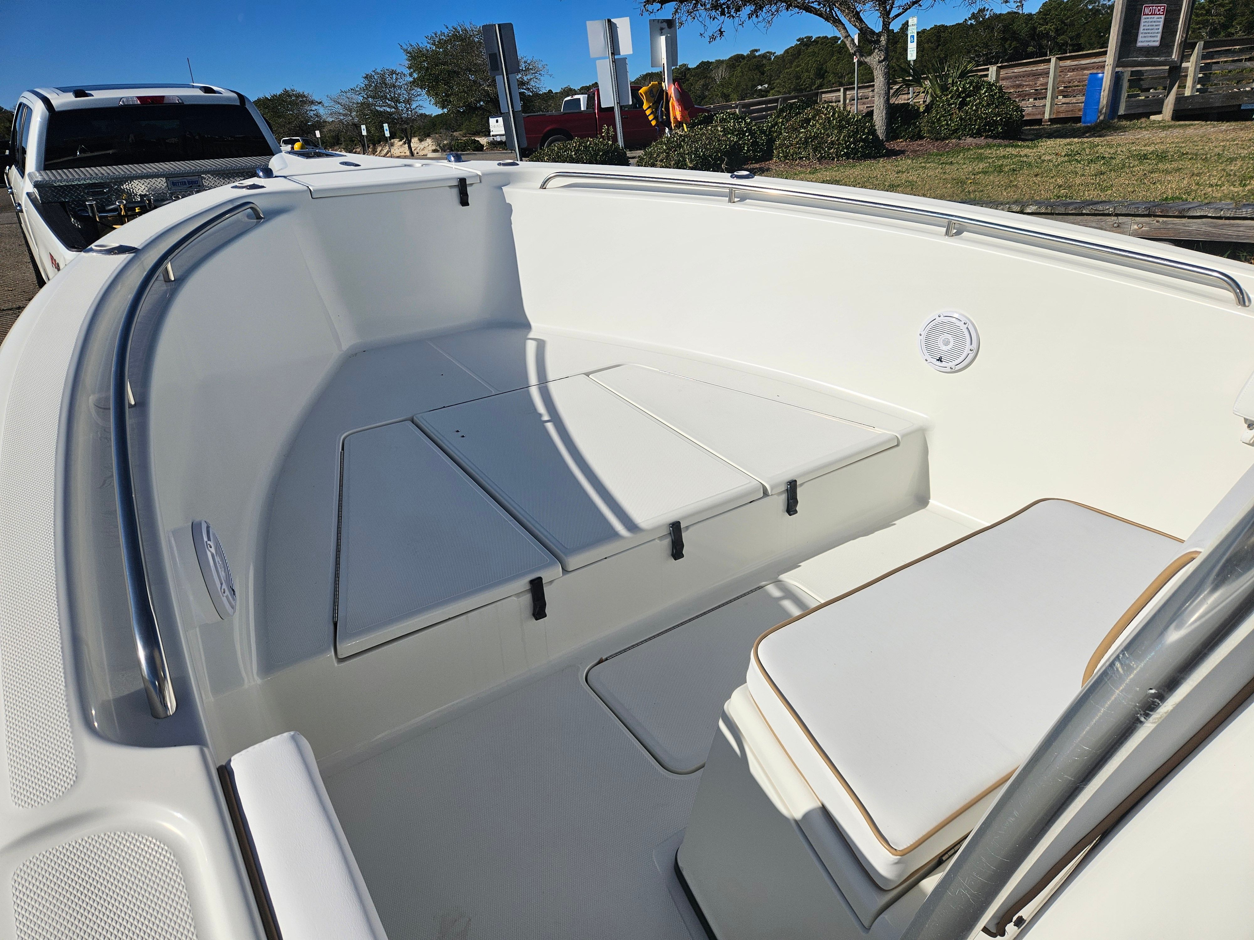 2004 Triton 2690 CC boat on trailer, front deck view.