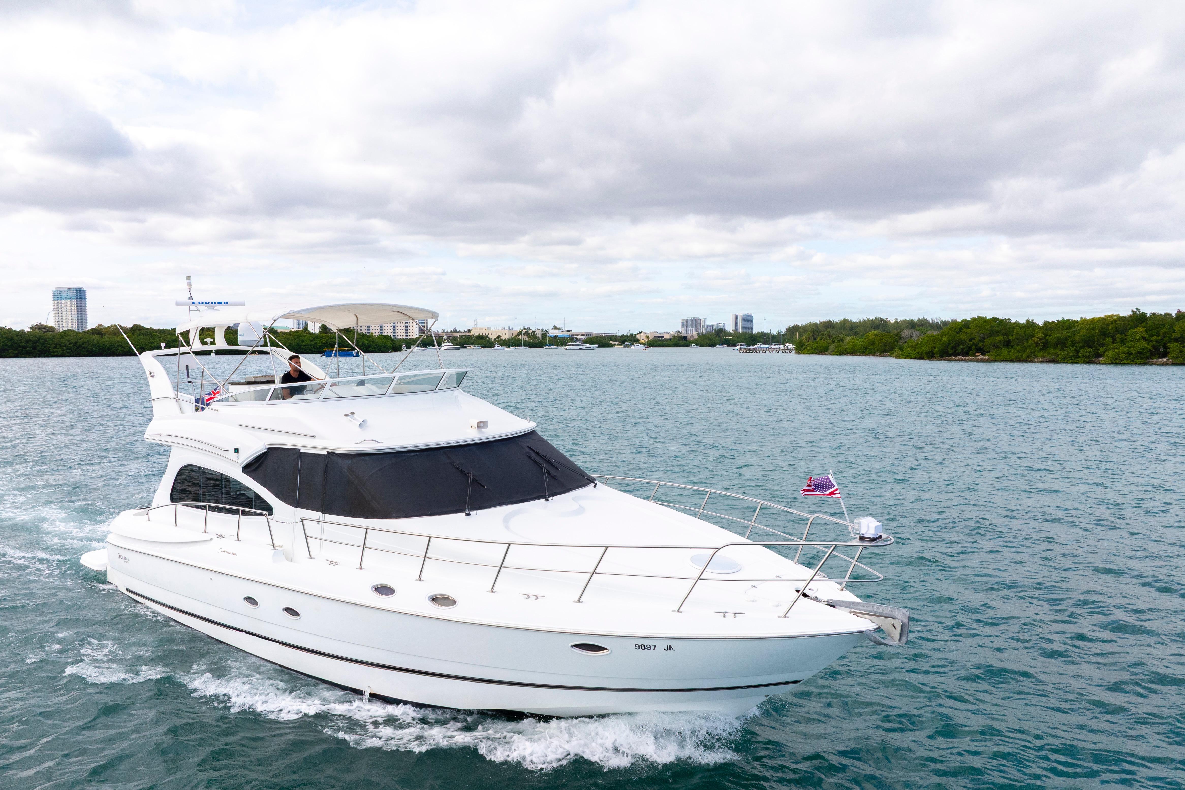 2001 Cruisers Yachts 5000 Sedan Sport cruising on a scenic waterway.