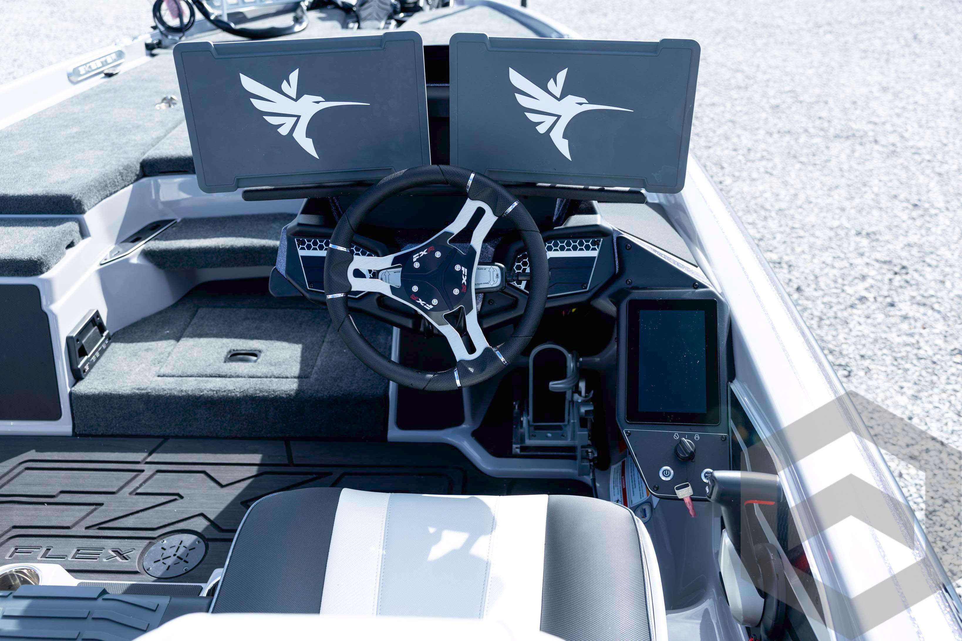 2026 Skeeter FXR20 FLEX boat cockpit with dual screens and modern steering wheel.