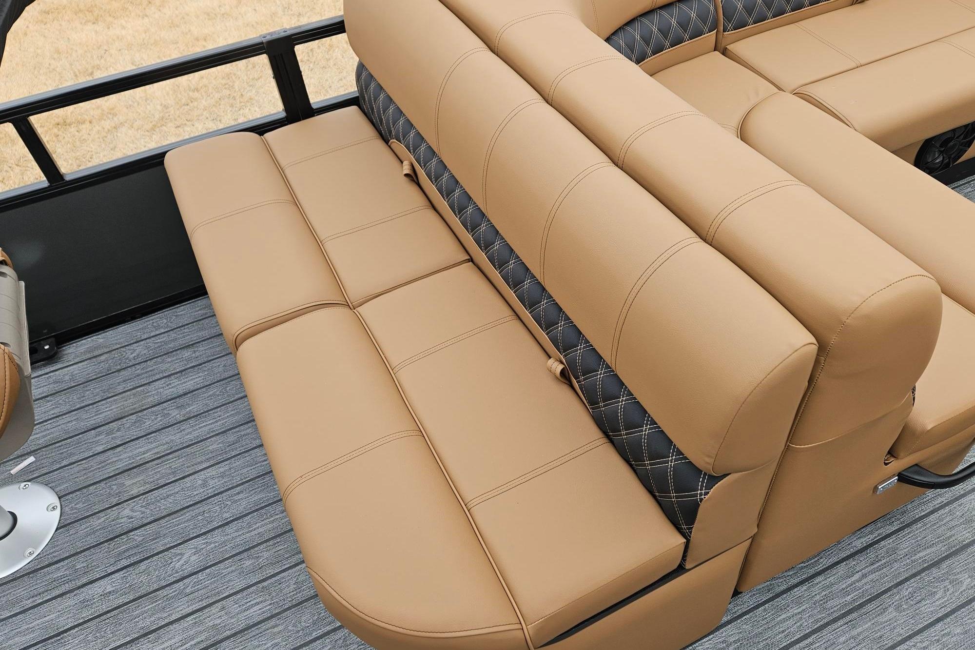 2026 Ranger 220F boat interior with tan leather seating and diamond-patterned accents.