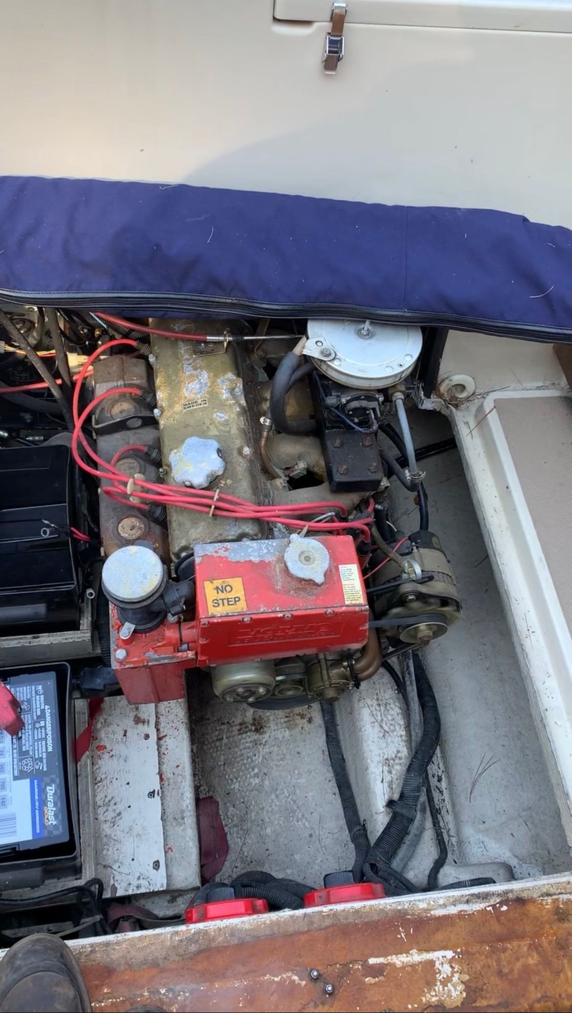 Engine compartment of a 1984 Tiara Yachts PURSUIT 2600 boat.