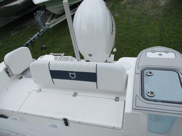 2025 Sea Fox 228 Commander boat interior with seating and storage compartments.