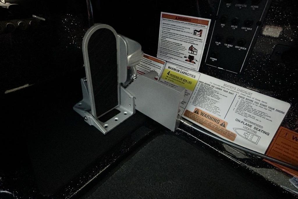 Interior of 2026 Skeeter ZX200 boat with control panel and safety instructions.