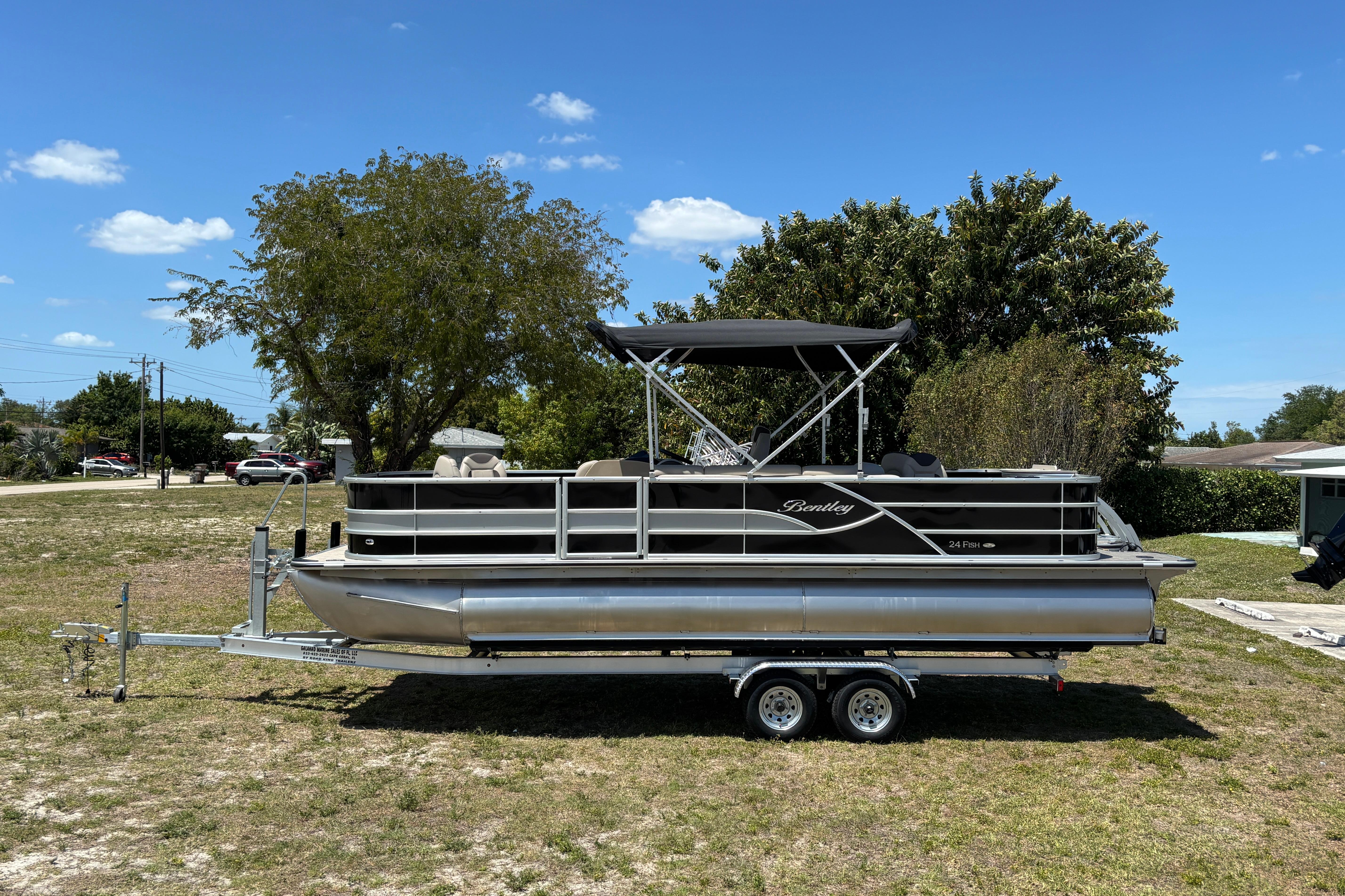 2026 Bentley Pontoons Fish 243 4-Point on trailer outdoors.