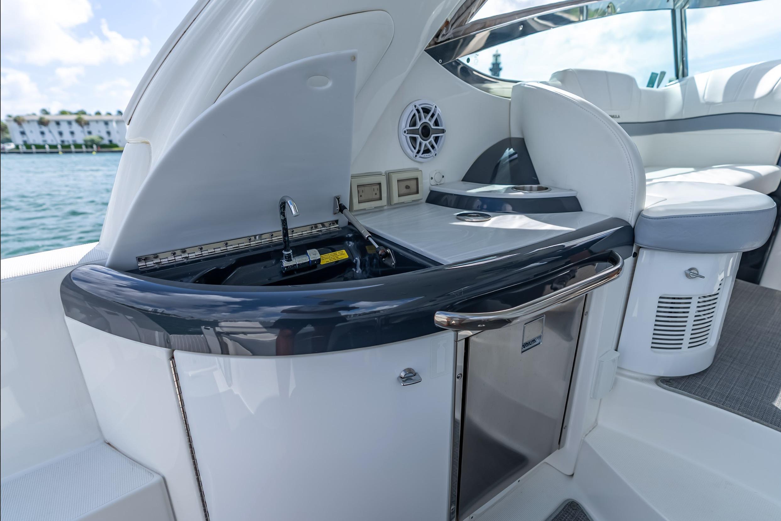 2022 Formula 40 Performance Cruiser interior with sleek kitchenette and seating area.