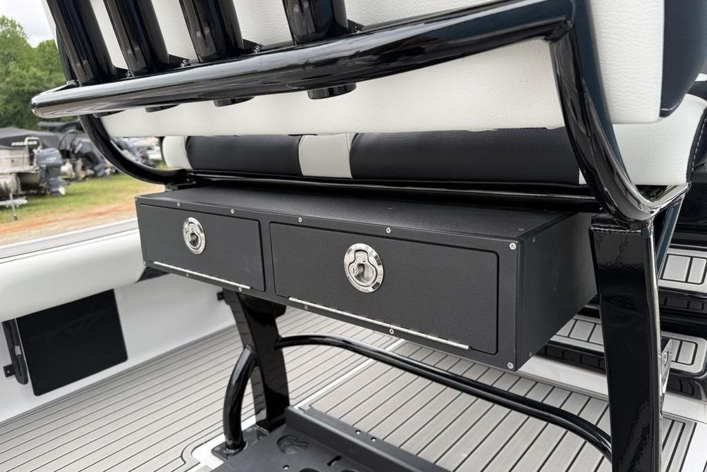 2026 Tidewater 2500 Carolina Bay boat seat with storage drawers and sleek design.
