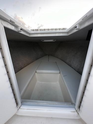 Interior cabin of 2001 Concept 30 PF Sport boat, featuring sleek, minimalist design.