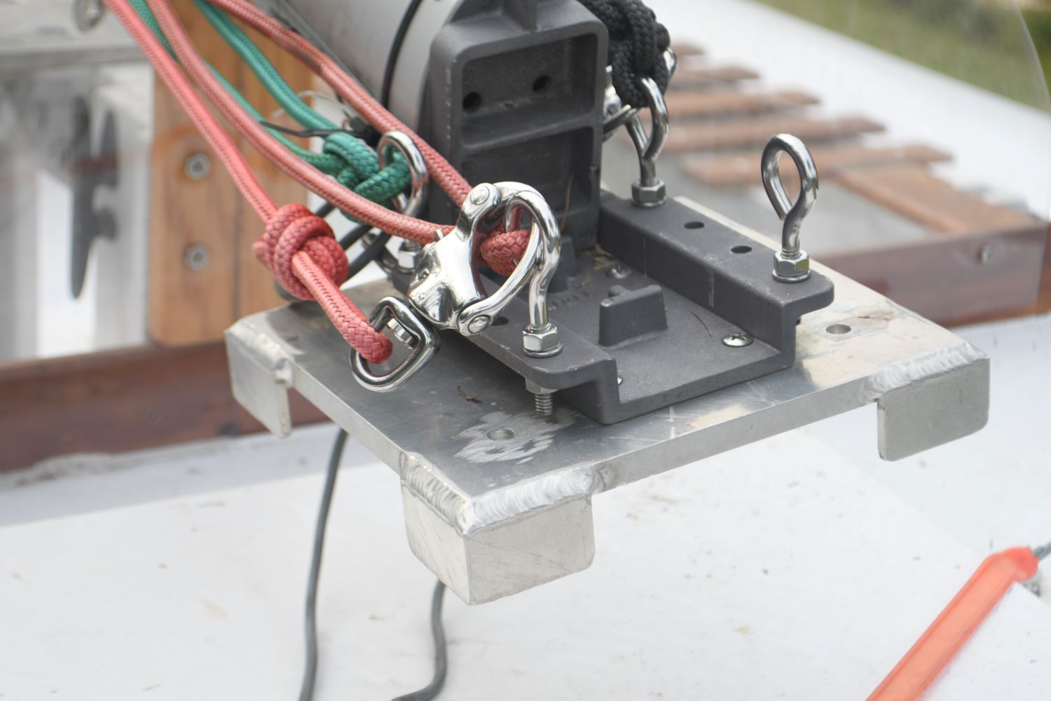 Close-up of a Custom Strike 18 boat part with ropes and metal fittings.