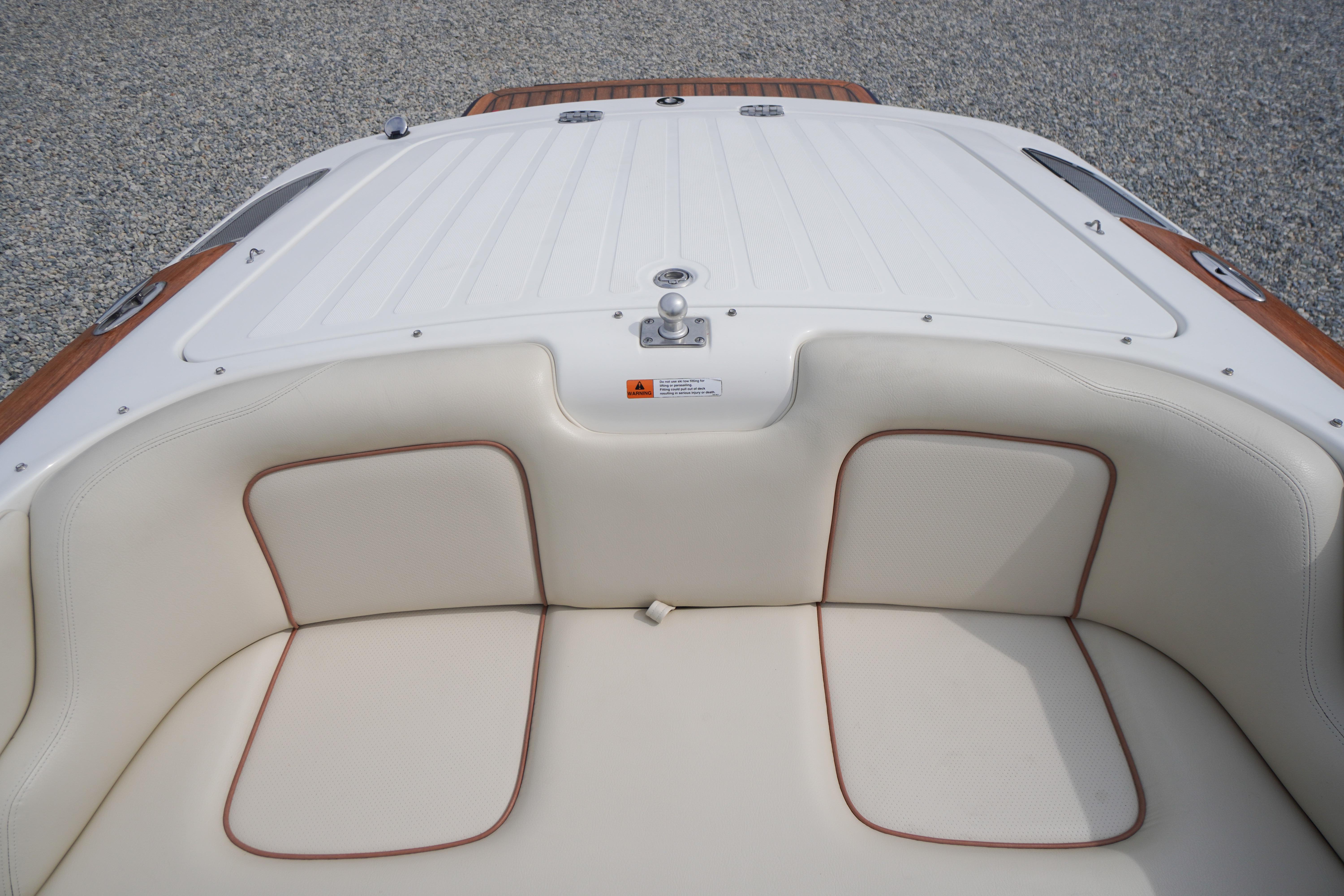 2005 Chris Craft Speedster Heritage boat interior with white cushioned seating.