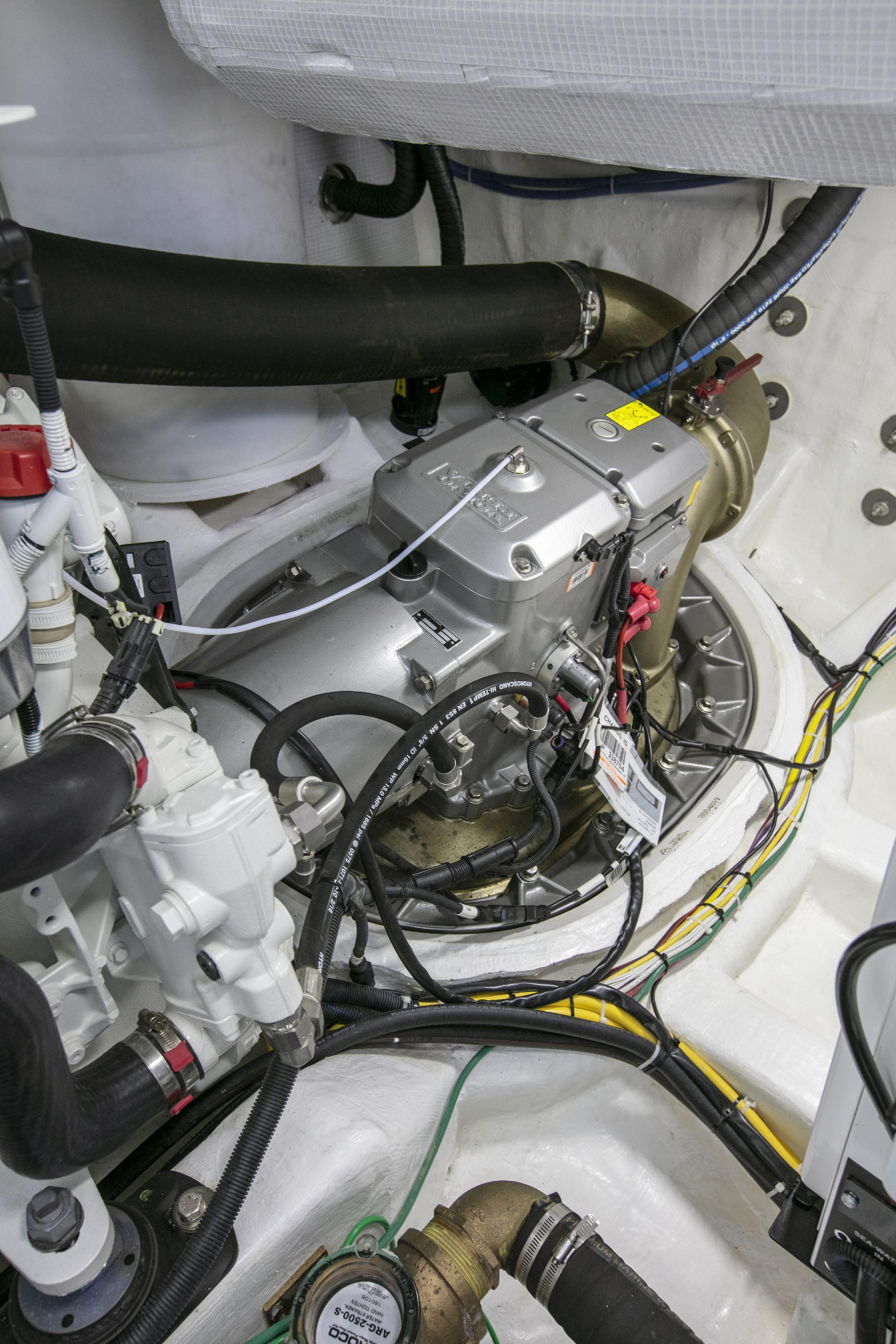 Engine room of 2026 Sabre 58 Salon Express with visible mechanical components and wiring.