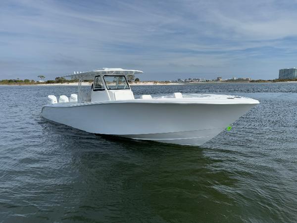2025 Yellowfin 39 Offshore boat on calm water, clear sky background.