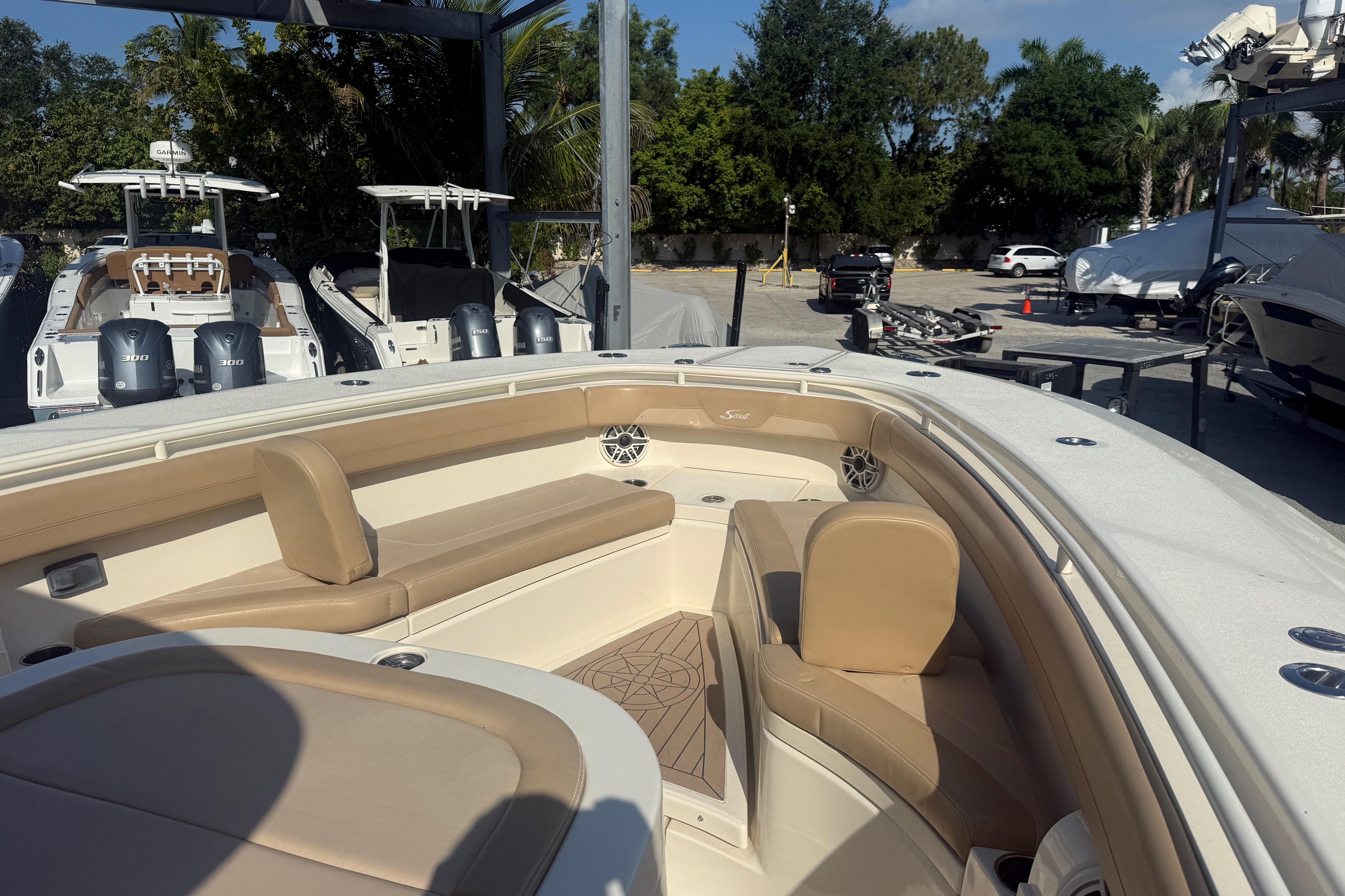 2022 Scout 355 LXF boat interior with beige seating and modern design.