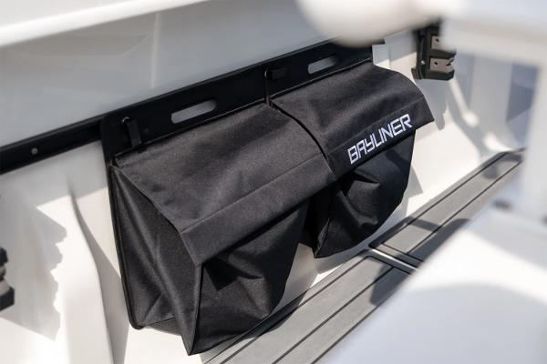 Manufacturer Provided Image: 2025 Bayliner Trophy T22CC storage compartment with branded black cover.