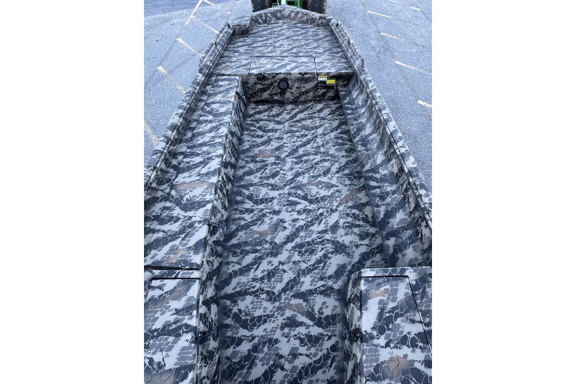 Camouflage interior of 2025 Havoc 1860 boat, showcasing spacious design and durable materials.