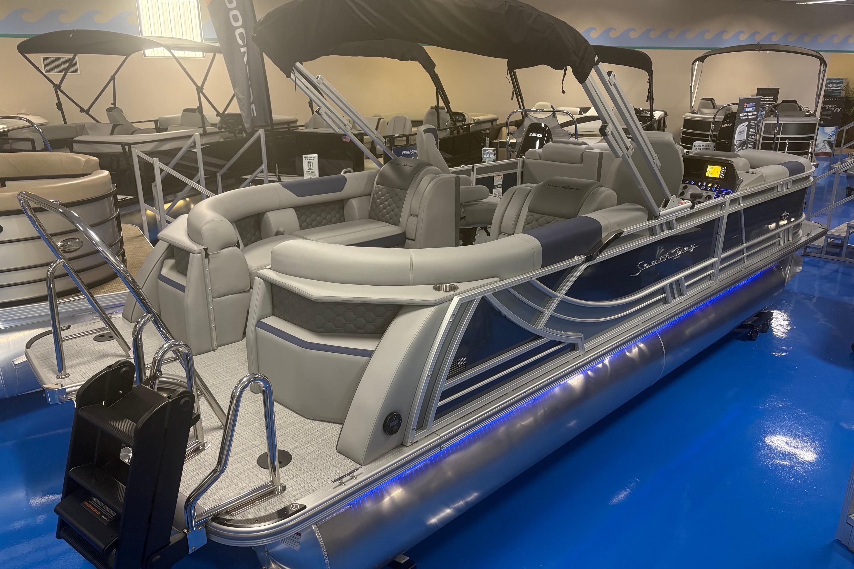 2026 South Bay 523RS pontoon boat with sleek design and luxurious seating.