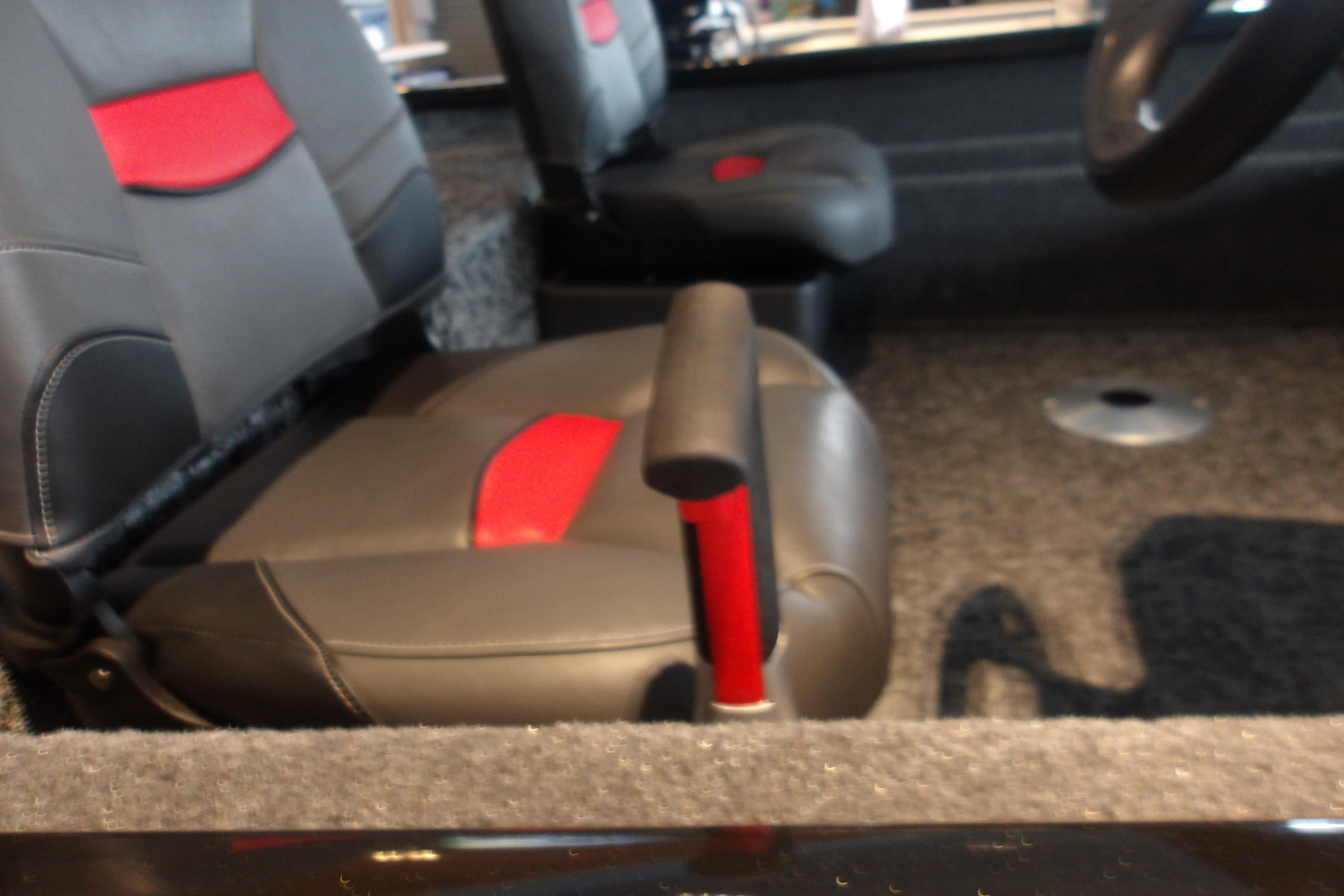 Interior of 2026 Tracker Pro Team 175 Crappie Edition boat with red-accented seats.