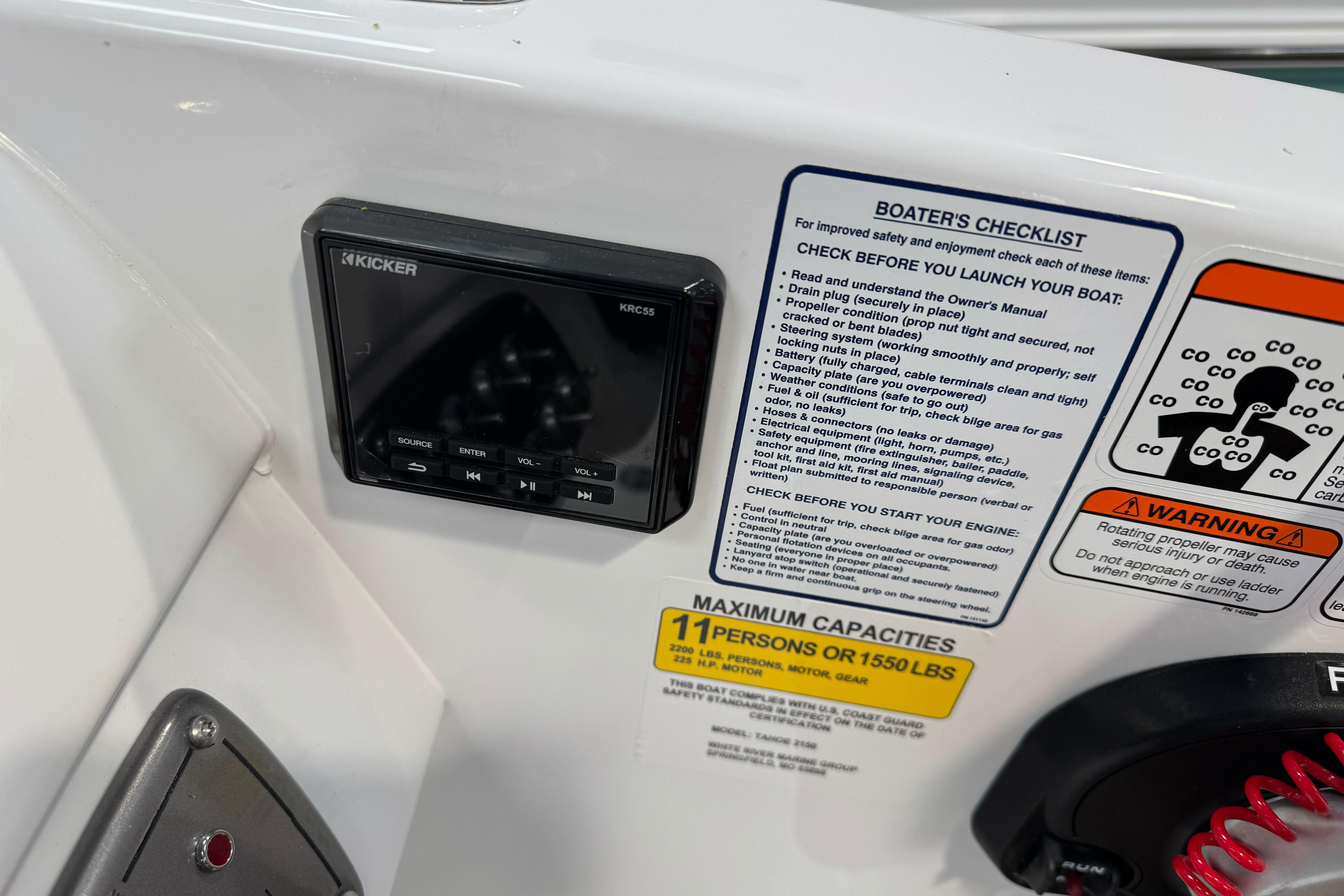 2026 Tahoe 2150 boat dashboard with Kicker control panel and safety checklist.