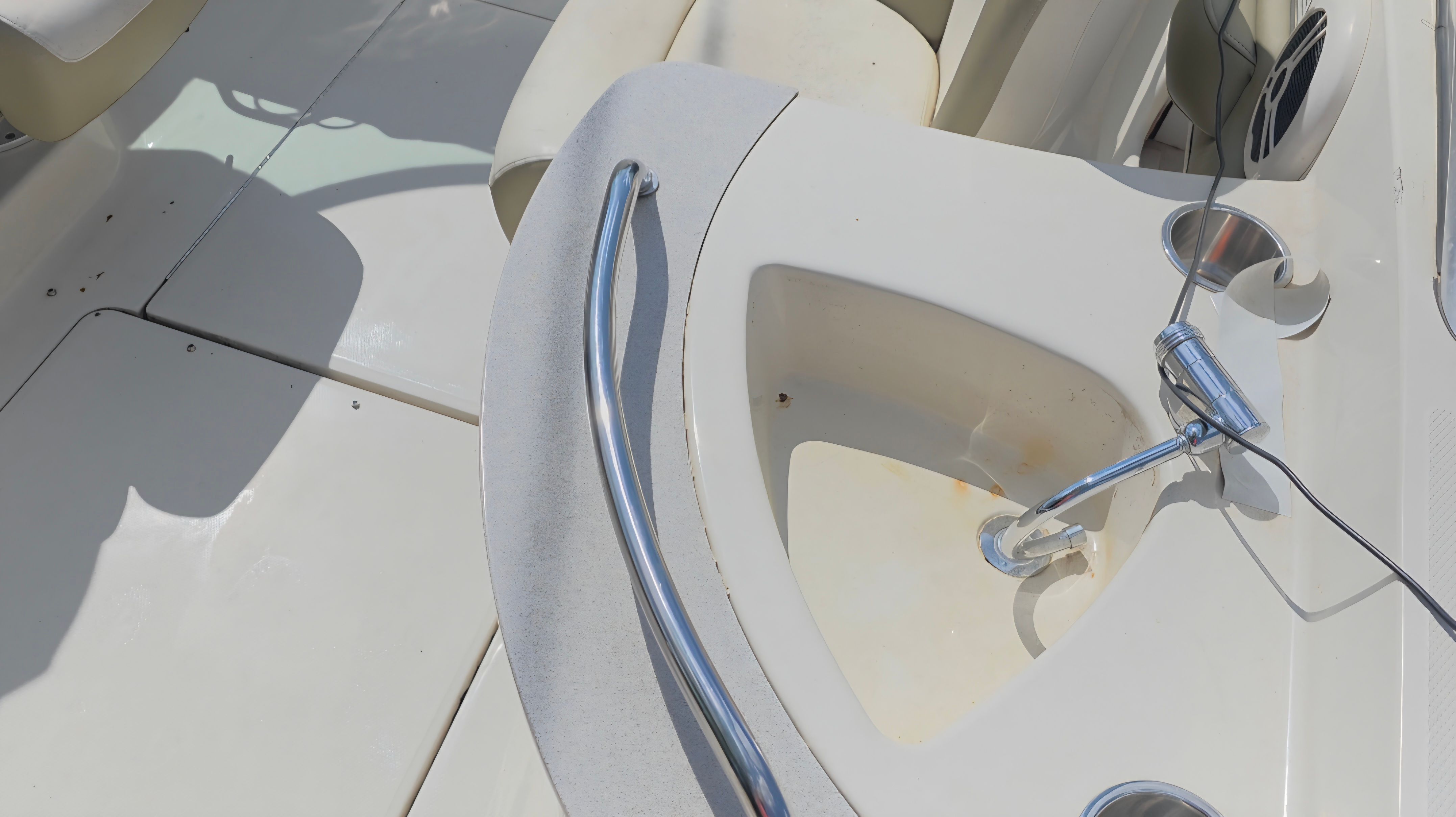 Interior of a 2007 Sea Ray 260 Sundeck with stainless steel handle.