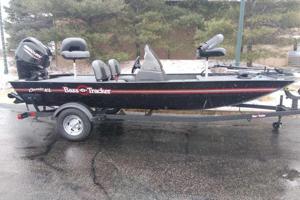2026 Tracker Bass Tracker Classic XL boat on trailer, parked outdoors.