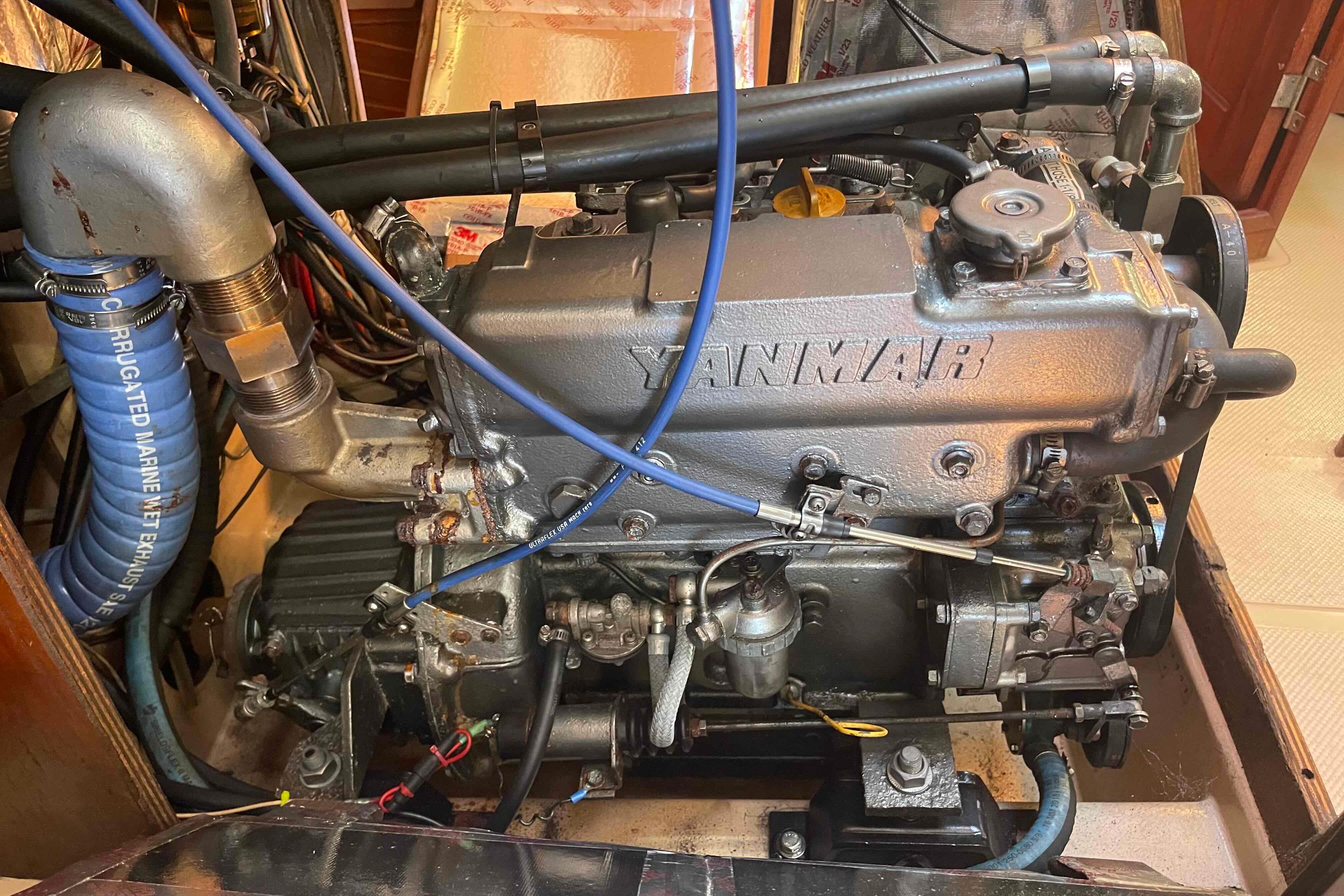 Yanmar engine in a 1989 Island Packet 35 sailboat, showcasing marine engineering.
