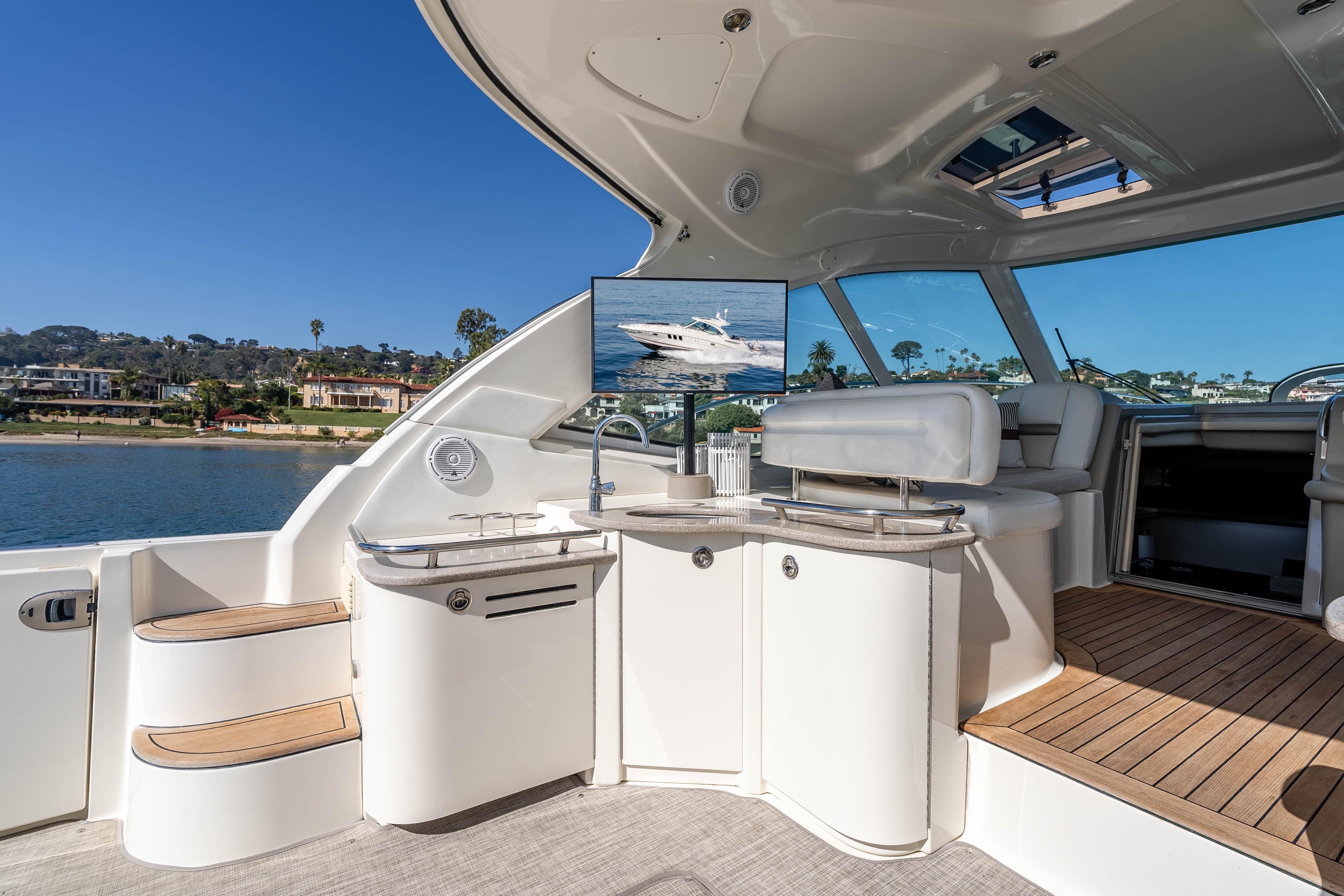 Luxurious 2007 Sea Ray 48 Sundancer yacht interior with sleek design and waterfront view.