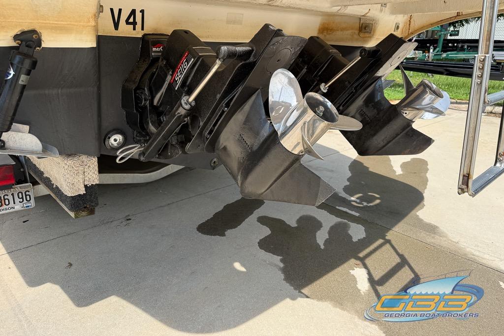 1999 Sea Ray 290 Sundancer boat stern with dual propellers and outdrive system.