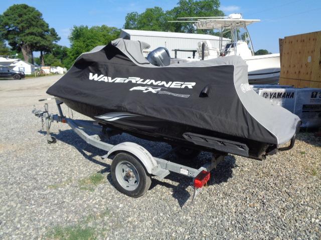 2015 Yamaha WaveRunner FX Cruiser H/O on trailer, covered, parked outdoors.
