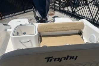 2023 Trophy T24 CC boat interior with seating and storage, featuring a sleek design.