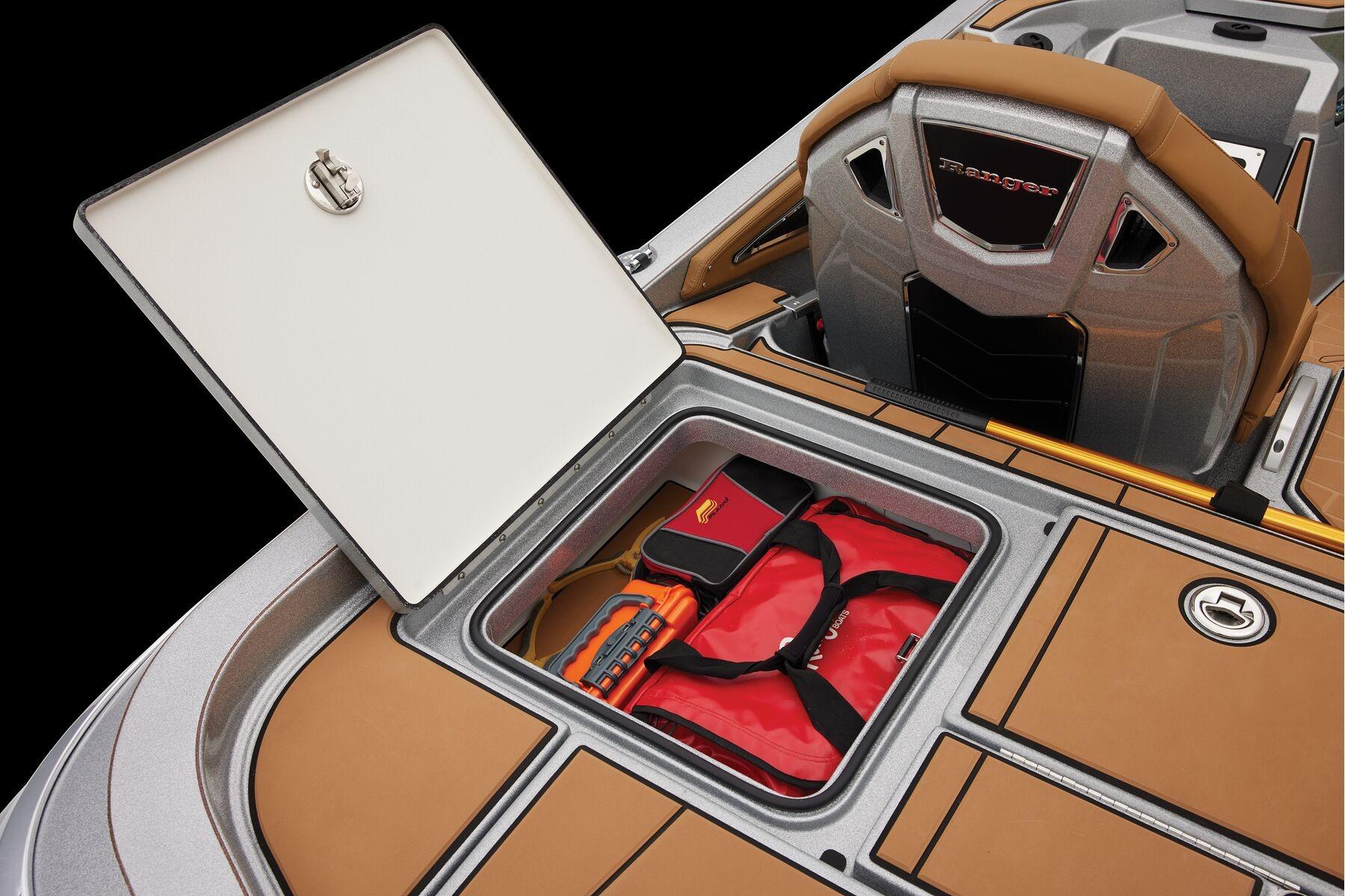 Manufacturer Provided Image: 2026 Ranger Z520R Ultra boat storage compartment with safety gear and accessories.