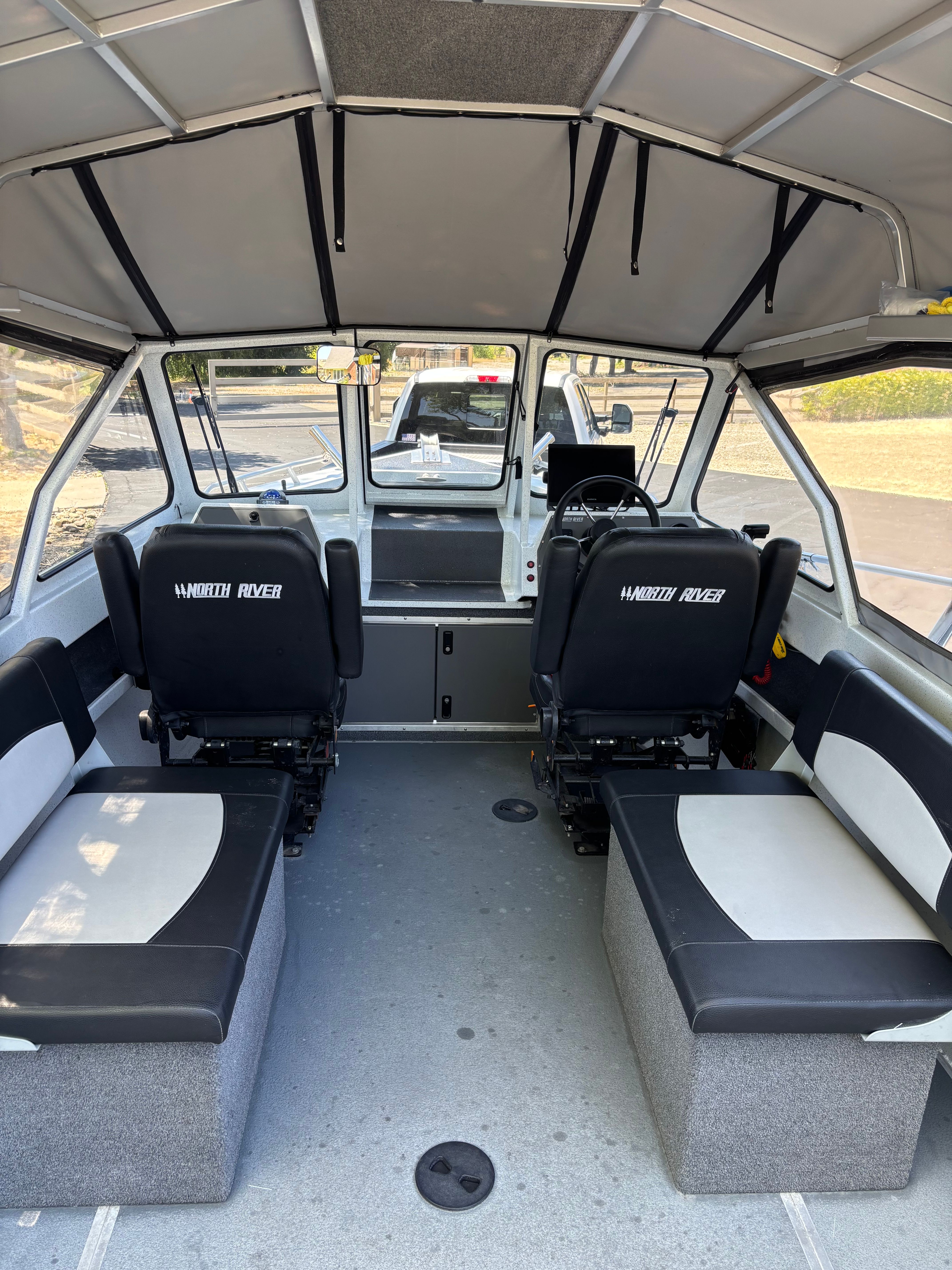 Interior of a 2020 Sea Hawk North River boat with seating.