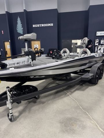 2026 Bass Cat Pantera II boat on display indoors, featuring sleek design and dual seating.