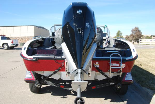 2024 Ranger 620FS Pro boat with powerful outboard motor, rear view.